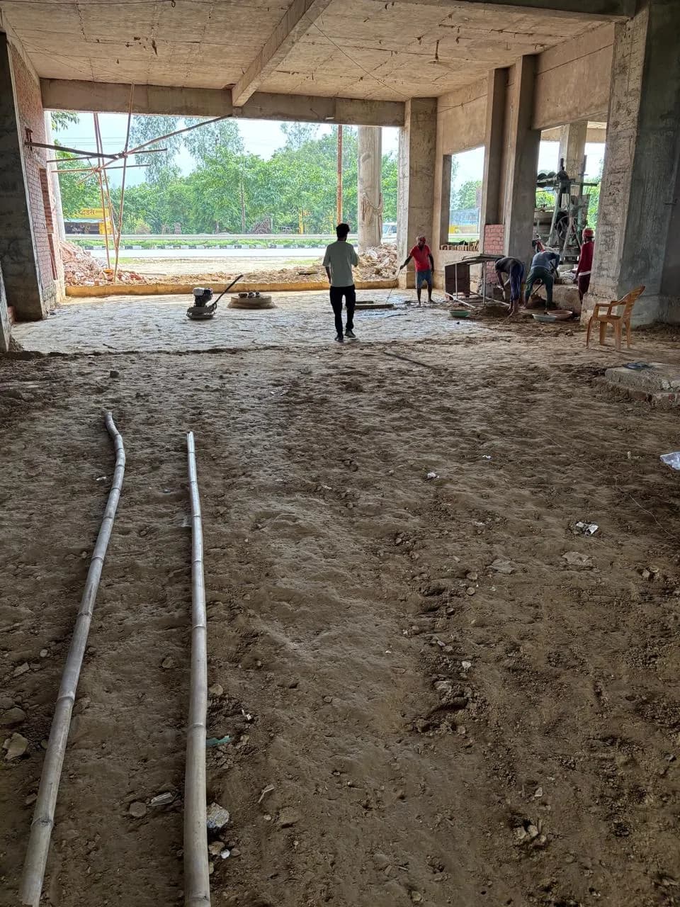 Prepared floor with conduits before concreting
