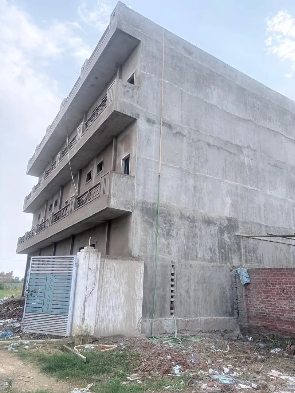 Side elevation with balconies and rooftop railing